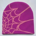Detailed knit texture of purple beanie featuring pink spider web jacquard pattern - Purple with Pink Web