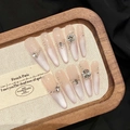 Roze kattenoog verloop plaknagels met zilveren steentjes op houten plateau - Extra Klein (XS) / 2631 Slank Stiletto