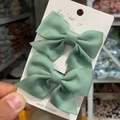 Pair of mint green ribbon bow hair clips displayed on a professional white jewelry card - Handmade Bow (A1723) / 2 Pcs/Set / Light Green