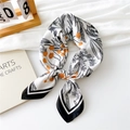 Floral silk square scarf with orange blooms and black border on elegant backdrop - Daisy / 70x70cm