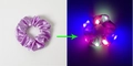 Purple LED satin hair scrunchie showing light-up effect in dark and natural light - Lighted-Violet