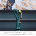 Modern dark green ceramic lovebird ornament with elegant gold abstract bird details - Love Birds Watch 9121