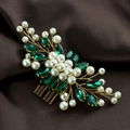 Detail of bridal hair comb with emerald marquise crystals and white pearls on gold wire - Green