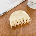 Creamy white marble acetate medium hair claw clip on elegant wooden tabletop - 6.8cm / Off-white