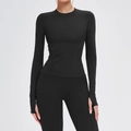 Zwarte naadloze yoga top met lange mouwen en duimgaten met bijpassende sportlegging - S / Premium Zwart