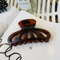 Large tortoiseshell resin hair claw clip with cutout design and amber floral pattern - Matte Red Brown