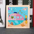 Submarine pattern 9-piece wooden puzzle for kids on a minimalist grey background - Submarine