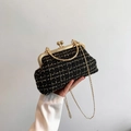 Elegant black and gold tweed handbag with clip frame and gold chain strap detail - Black