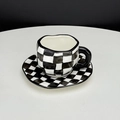 Hand-kneaded ceramic coffee cup and saucer set with black and white checkerboard pattern - Black Checkerboard Cup & Saucer