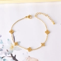 Elegant gold clover bracelet featuring five hollowed-out charms and adjustable chain - Four Petal Flower