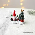 Mini resin Christmas gnome figurine with green tree and gift box on snow base - Gnome Tree