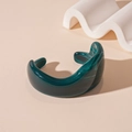 Close-up of a vintage dark green marble resin cuff bracelet with a warm minimalist backdrop - Green Irregular Open Style (70#)