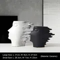 Modern minimalist white ceramic ring sculpture available in large and small sizes - Wind Child Portrait Vase Set