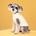 Chic cream white knitted cable sweater for dogs on soft yellow background - White