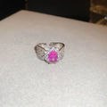 Close-up of pink oval zircon ring with flower halo and woven silver pave band - Oval - Personalized Chain Style