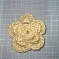 Detailed close-up of a 7cm triple-layered beige crochet flower with yarn texture - 7cm / Iceland Yarn Beige