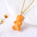 Vibrant orange gummy bear pendant with gold-plated cross chain necklace for women - Orange
