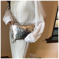 Sparkling silver sequin mini clutch bag with a detachable leather wrist strap - Silver