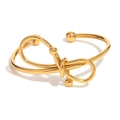 Bracelet jonc ouvert en acier inoxydable plaqué or 18 carats avec design nœud chic - Or