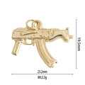Macro shot of AK rifle shape gold pendant with 19.5mm height and 23.2mm width - Gold Rifle