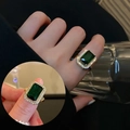 Anello elegante in titanio dorato con zircone verde smeraldo e splendido halo di diamanti - Anello di Smeraldo