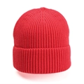 Close-up of a red ribbed knit beanie showing thick texture and warm winter material - Red