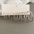 6 pairs of silver hoop earrings set with twisted, smooth, and wavy designs on display - 31# Silver Pin (12-Piece Set) / Silver