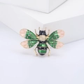 Exquisite bee enamel brooch with gold-tone metal outline and colorful wings design - Green