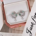 Macro detail of silver floral wreath earrings with opal stones in a pink velvet box - 28# Silver Butterfly Floral Multi-color Zirconia