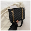 Black monogram tote bag with gold chain strap and geometric pattern detail - Black