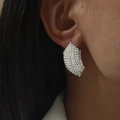 Fashionable silver earrings with irregular textured surface worn on ear lobe - Silver Irregular Texture Geometric (DTE1216302S)