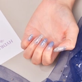 Detailed close-up of blue gradient long oval nails with silver glitter and sequins - Blue Gradient Silver Glitter Style (SS-048)