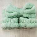 Soft pale green plush headband and wristband set featuring a large decorative bow tie - Green Headband & Wristbands Set