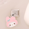 Detailed close-up of My Melody character charm in pink enamel on stainless steel link - 0200 - Foundation Blue Bow - Silver Trim
