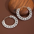Punk style chunky silver chain link hoop earrings for women on a dark leather background - Silver Thick Chain Style
