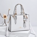 White structured handbag with heart logo, gold hardware and silk scarf handle decor - White