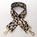 Detailed view of wide leopard print bag strap with golden lobster clasps and metal buckle - Khaki