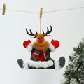 Detail of reindeer Christmas ornament with felt fabric and red checkered scarf - Deer