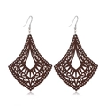 Macro shot of dark brown wooden rhombic earrings with intricate hollow-out floral patterns - Style 11