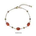Detail view of 18K gold chain bracelet featuring red aventurine stones and clasp - Gold - Aventurine