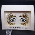 Face crystal sticker set featuring yellow and brown waterdrop rhinestones in packaging - 1080