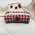 Detailed view of the red and white checkered storage bag with crochet cherry accents - Handheld Makeup Box / Red