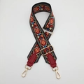 Close-up of ethnic embroidered canvas bag strap with red leather ends and gold metal hooks - Wine Red + Wine Red Leather + Gold Hook