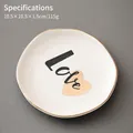 4-inch white ceramic jewelry tray with Love text and gold-trimmed irregular edges - 10.5cm Irregular Plate-LOVE2