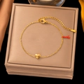 Bracelet élégant avec pendentif cœur doré sur boîte à bijoux et fermoir réglable S925 - Bracelet mini cœur doré (SLE2242)
