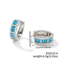 Detail view of silver hoop earrings with sky blue stones and size 0.6cm by 1.6cm - Silver Base-Sky Blue Zirconia