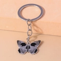 Detailed view of a gothic butterfly skeleton keychain with silver alloy finish - Skull Butterfly
