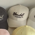 Embroidered cotton baseball caps in cream, charcoal, yellow and pink variants - Beige