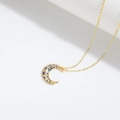 Golden crescent moon necklace with blue enamel and sparkling crystal accents - Blue