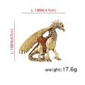 Golden dragon brooch pin with amber rhinestones and detailed textured wings - Dinosaur B07067